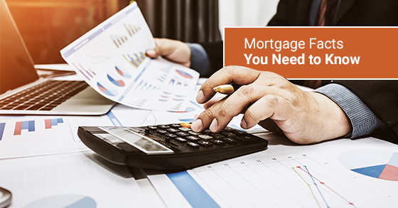 Financiers calculating mortgage rates.